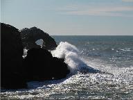 Wind, Waves, and water-carved Bridge